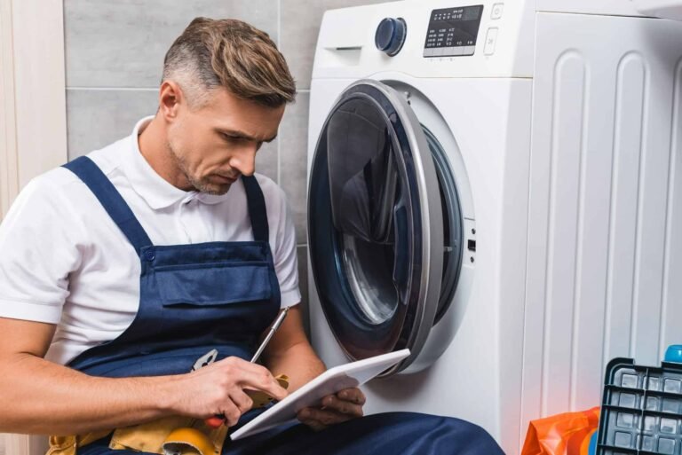 Technician repairing washing machine in Dubai | Quick Repair service